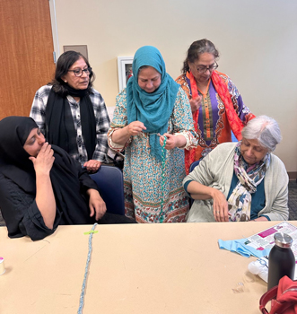 Muslim women participating in a community wellness program through Olive Community Services in Orange County, CA
